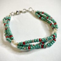 Triple strand 8/0 seed bead green with red, gray, pearlescent, and silver accents