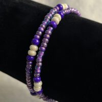 Double strand purple 8/0 seed bead bracelet with pearlescent accent beads