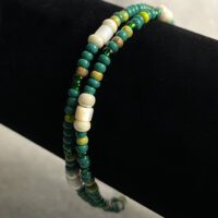Green 8/0 seed bead double strand bracelet with the pearlescent accent beads