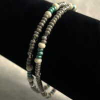 Grey 8/0 seed bead double strand bracelet with green, clear, and pearlescent accent